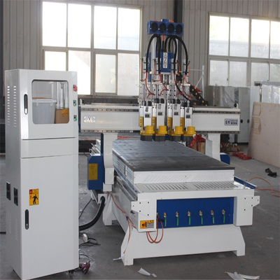 China Double tool changer automatic cnc woodworking router machinery with drilling supplier